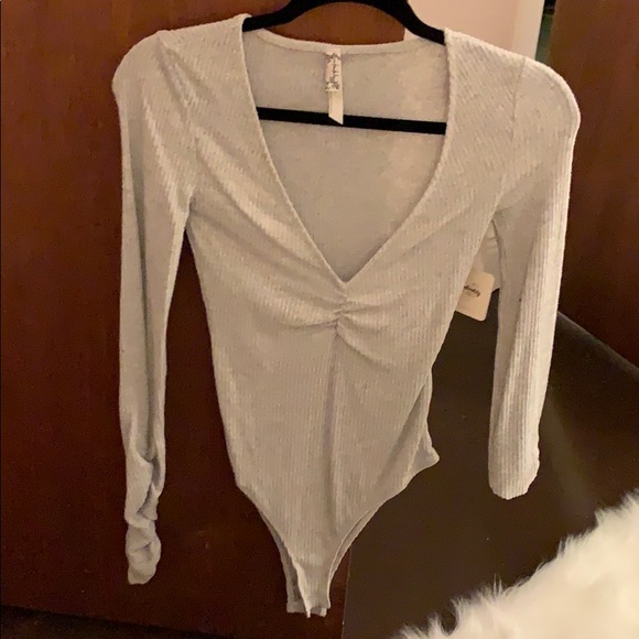 Free People Tops - BRAND NEW W. TAGS. Free people bodysuit Free People Tops - BRAND NEW W. TAGS. Free people bodysuit